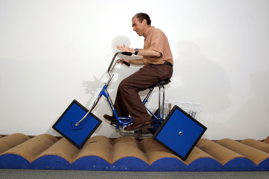 Stan Wagon riding the square wheel bicycle